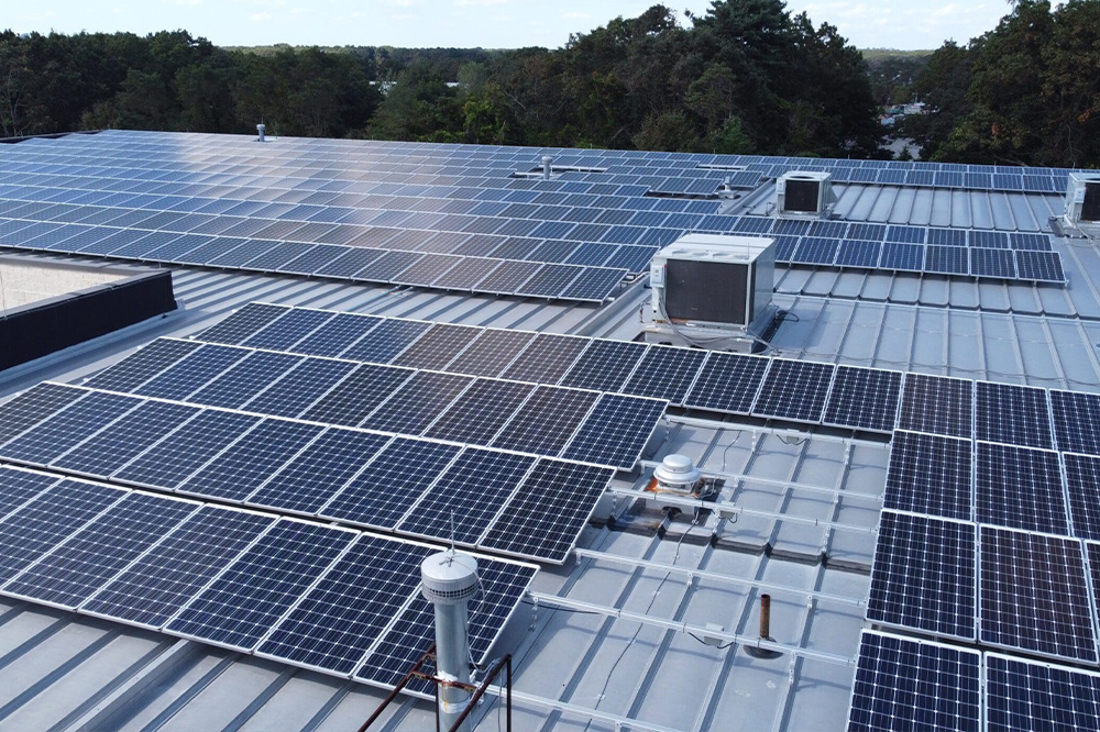 Commercial solar panels installed on a Long Island rooftop