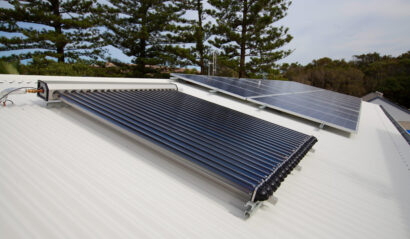 Solar panels and solar hot water on house woof