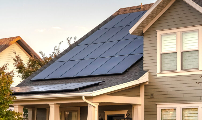 Panorama frame Solar photovoltaic panels on a house roof. Solar photovoltaic panels on a house roof for providing sustainable alternative energy from natural resources